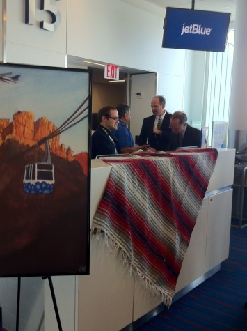 Said poster in foreground. The tall guy in the background is the mayor of Albuquerque.