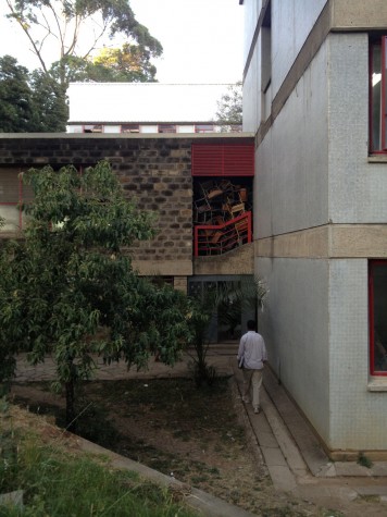 Spare chairs stacked up in a stairwell at Addis Ababa U., like some kind of art installation.